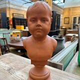 Child bust in terracotta