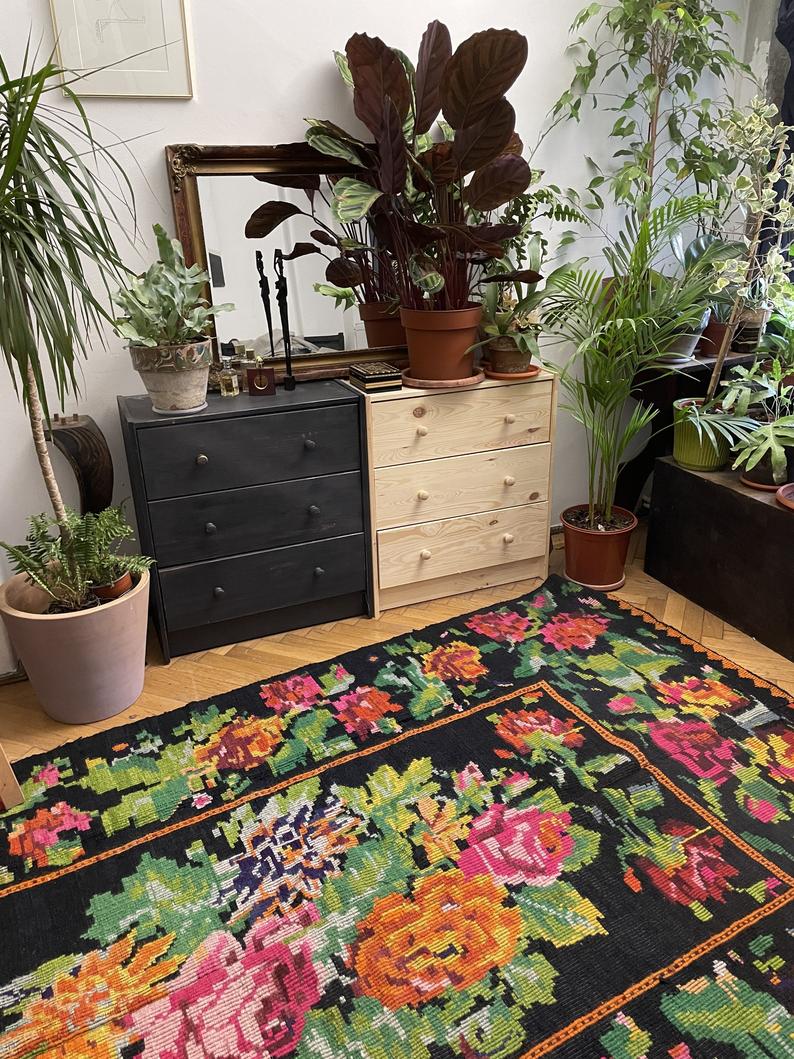 Floral handwoven carpet, colors on a black background - 262x160cm