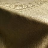 Old linen tablecloth and evening tinted in vermeil