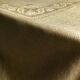 Old linen tablecloth and evening tinted in vermeil