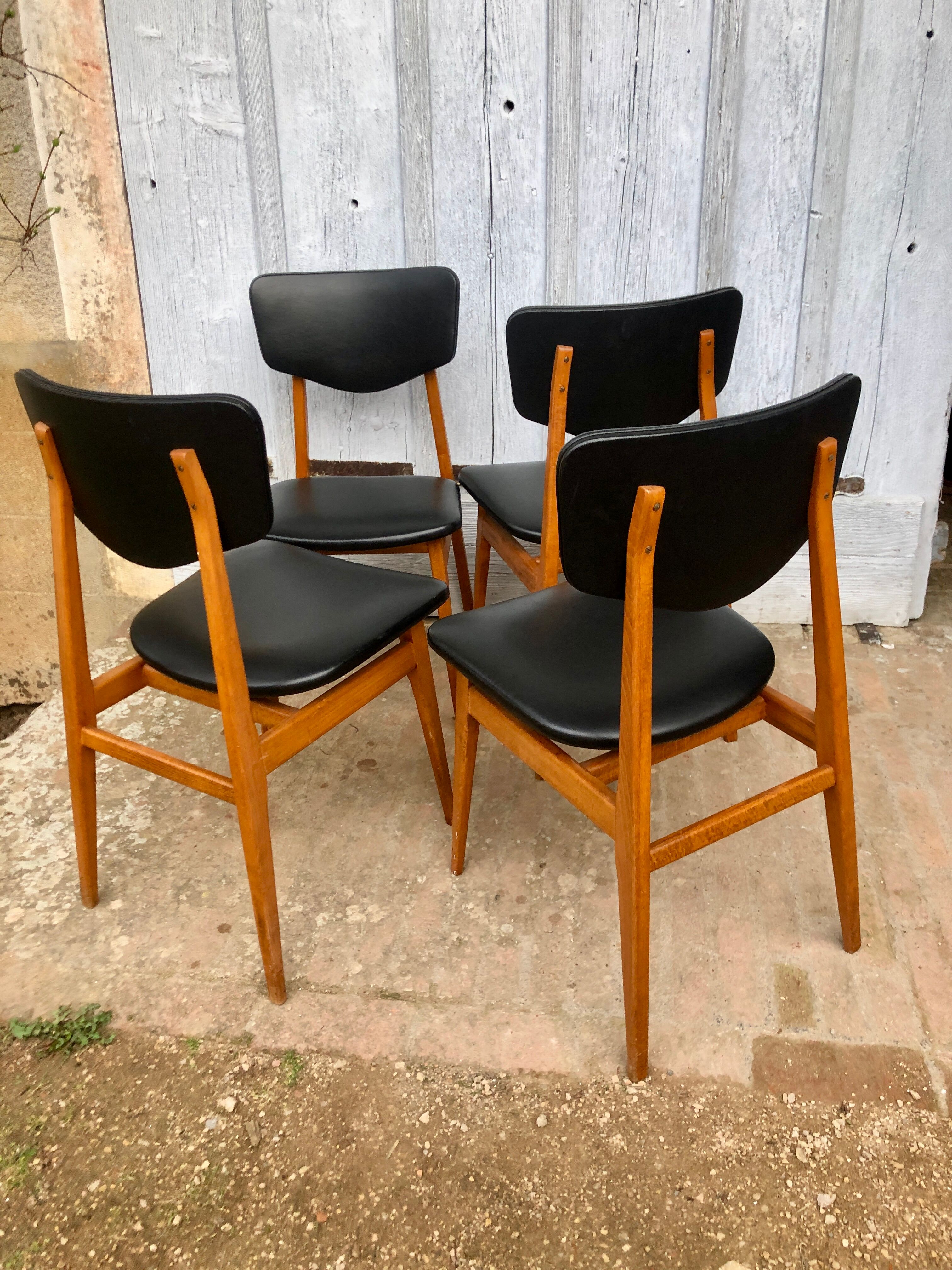 Set of 4 Scandinavian teak and black skai chairs