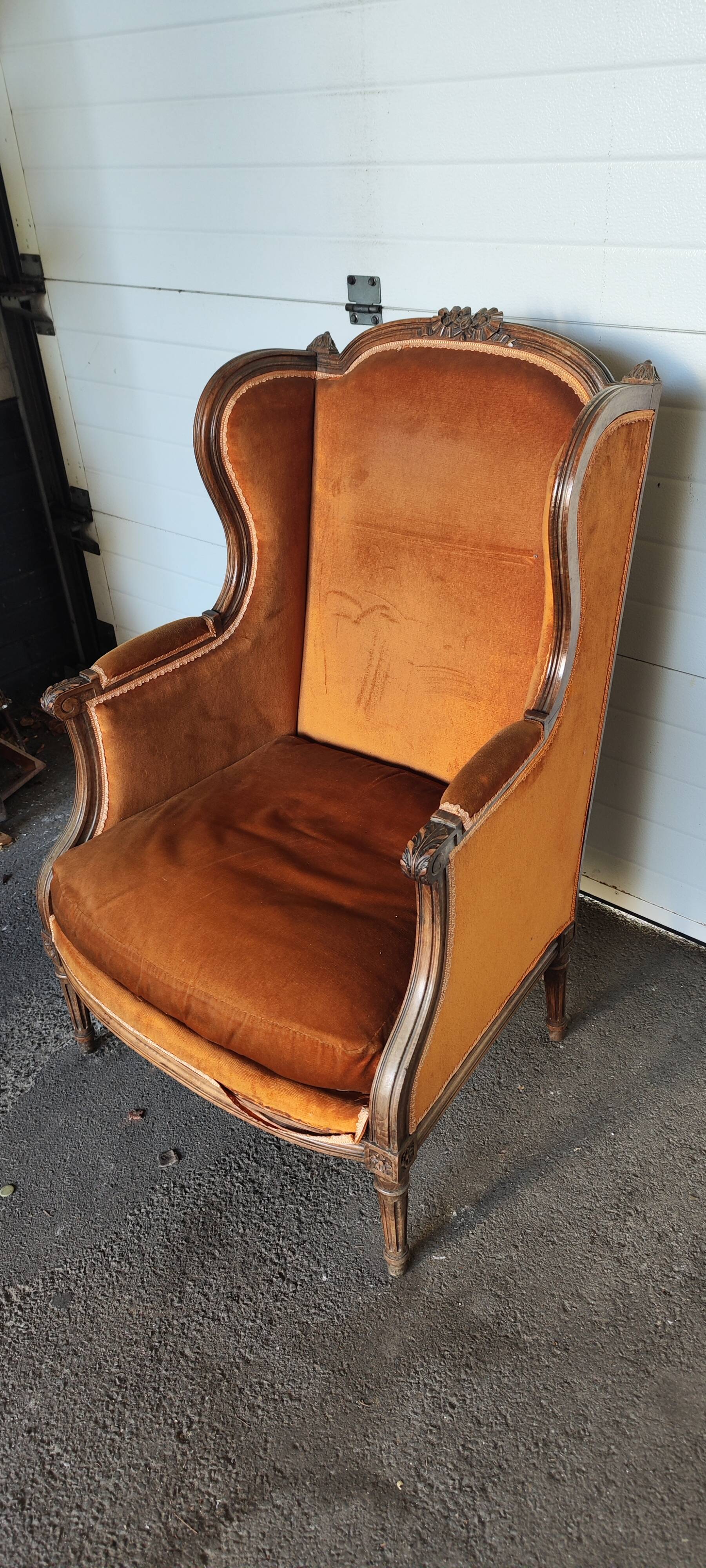 Large Louis XVI style bergère armchair in amber brown velvet