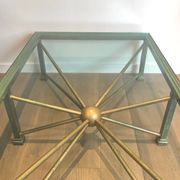 Importante table basse en acier et fer forgé patinée et dorée