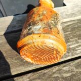 Vase orange en grès pyrité texturé
