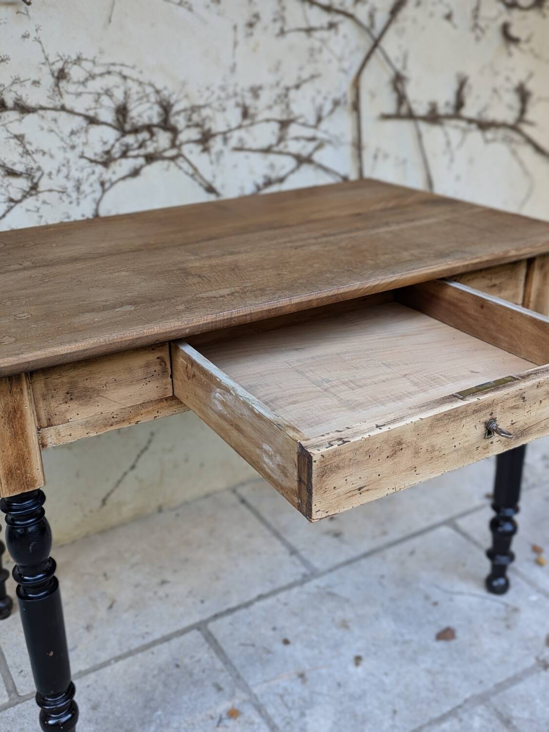 Solid wood desk, black base
