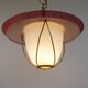 Suspension in perforated red lacquered metal, brass and opaline in the style of Mathieu Matégot