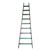 Antique ladder with green patina