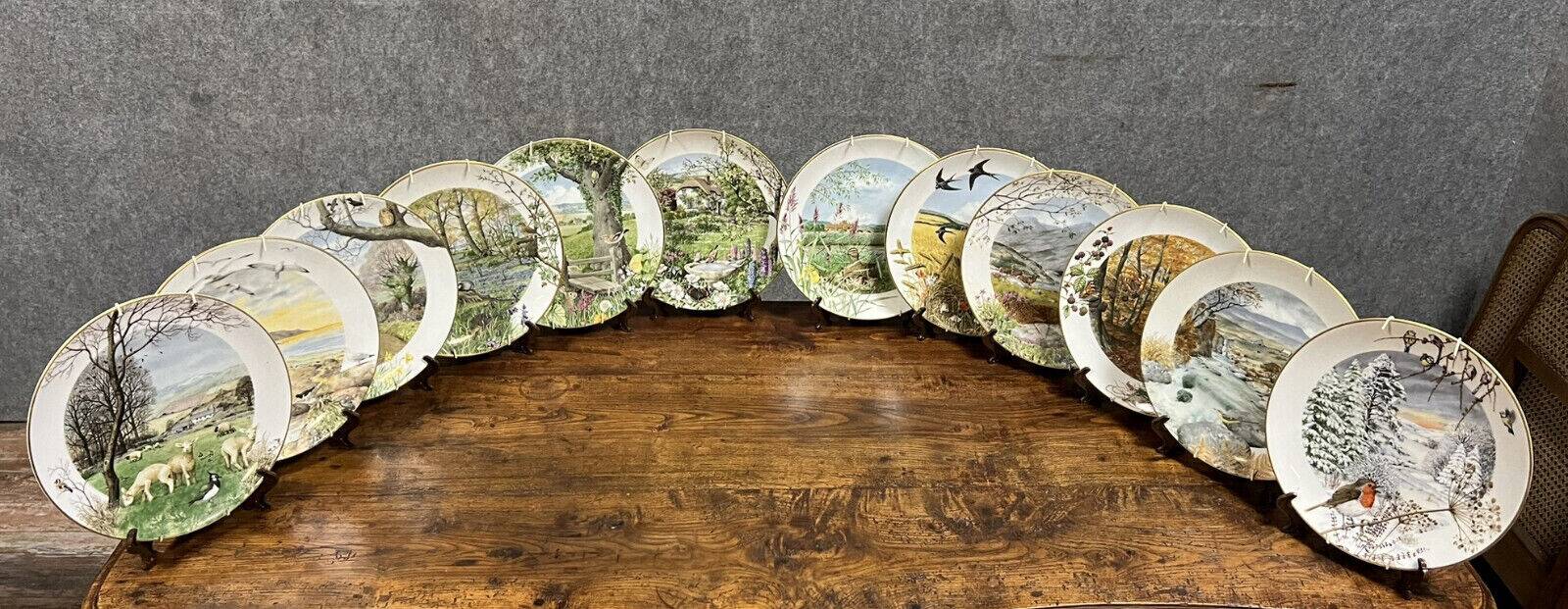 Peter Banett: collection of 12 painted porcelain wall plates