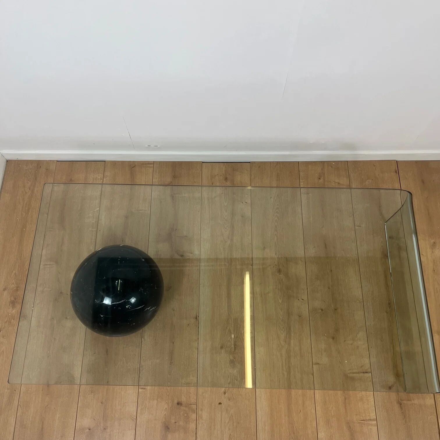 Coffee table in curved glass and black marble sphere, Giorgio Cattelan for Cattelan, 1980