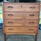 Danish commode from the 1960s in brown teak, with 4 drawers and elegant tapered legs.