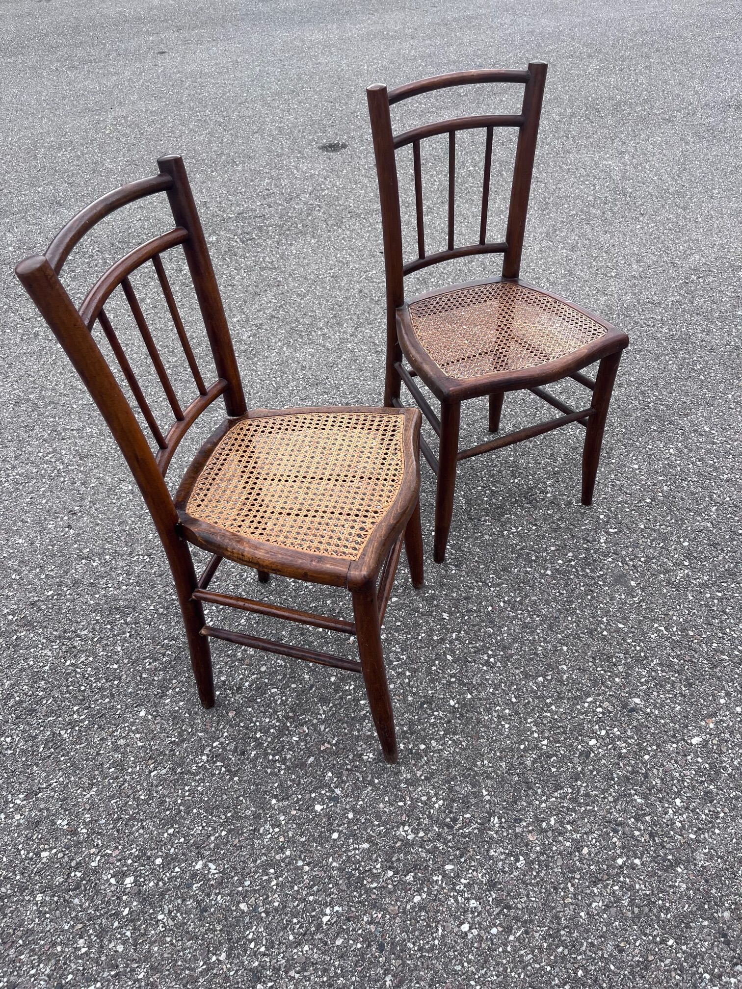 Pair of canned bistro chairs