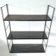 Patinated metal wall shelf