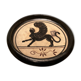 Cup decorated with winged sphinx in Ciboure sandstone signed Marie Fernandez