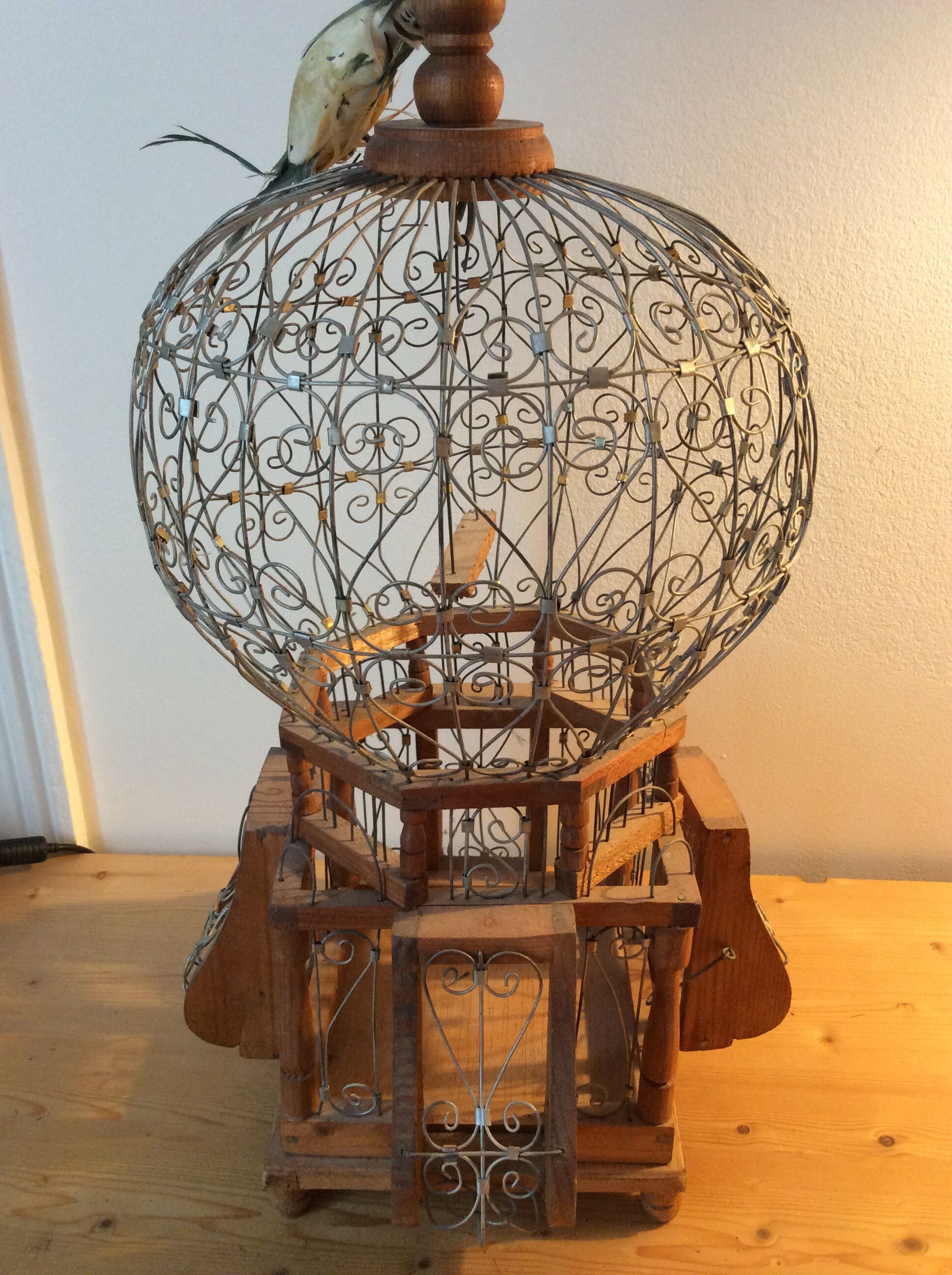Pretty old bird cage.