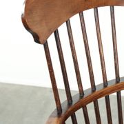 Antique English Windsor highback chair from the 19th century