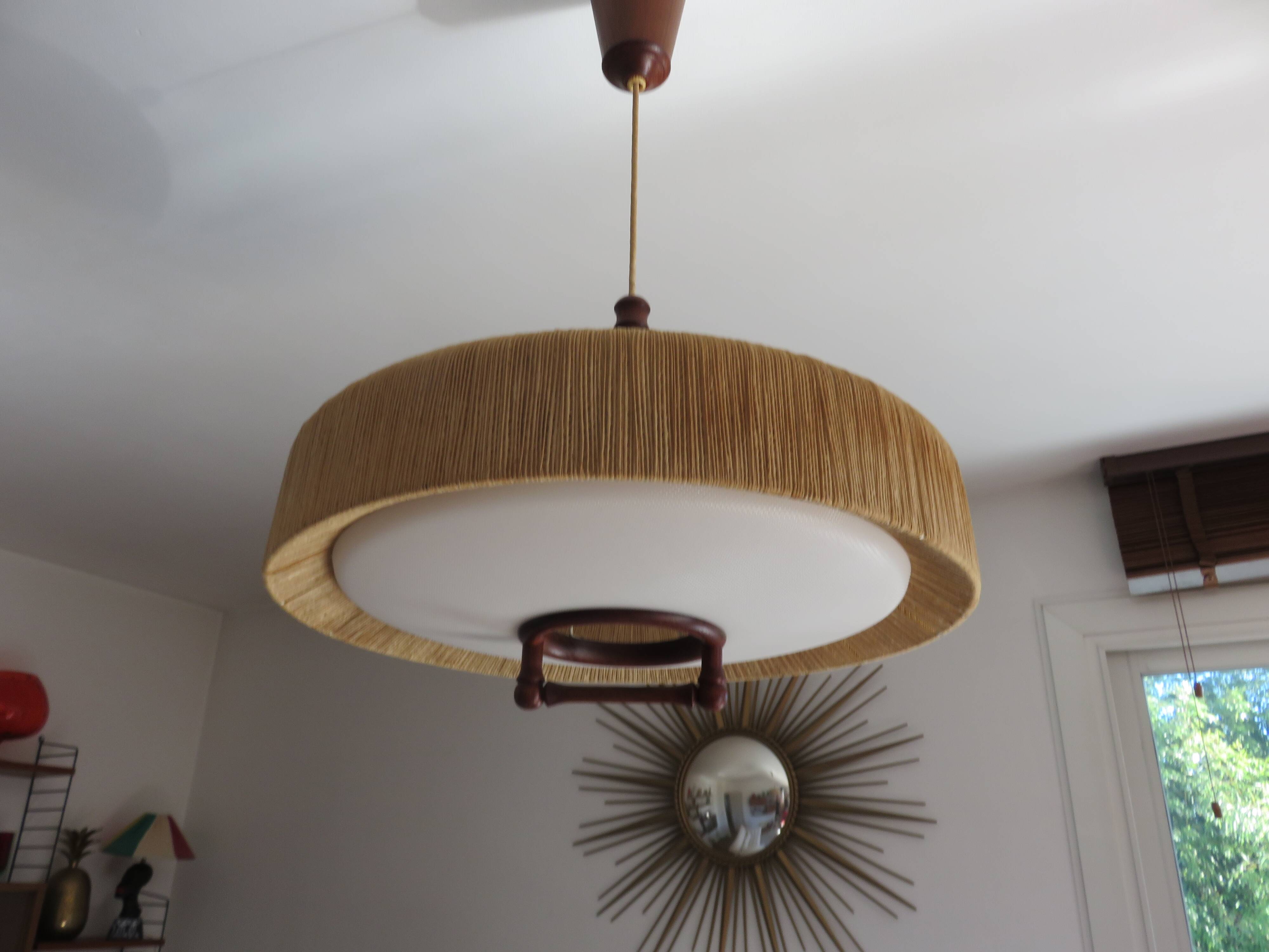 Suspension made of sisal and teak around 1960.