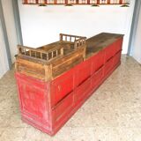 Former red patina and oak tray trading counter
