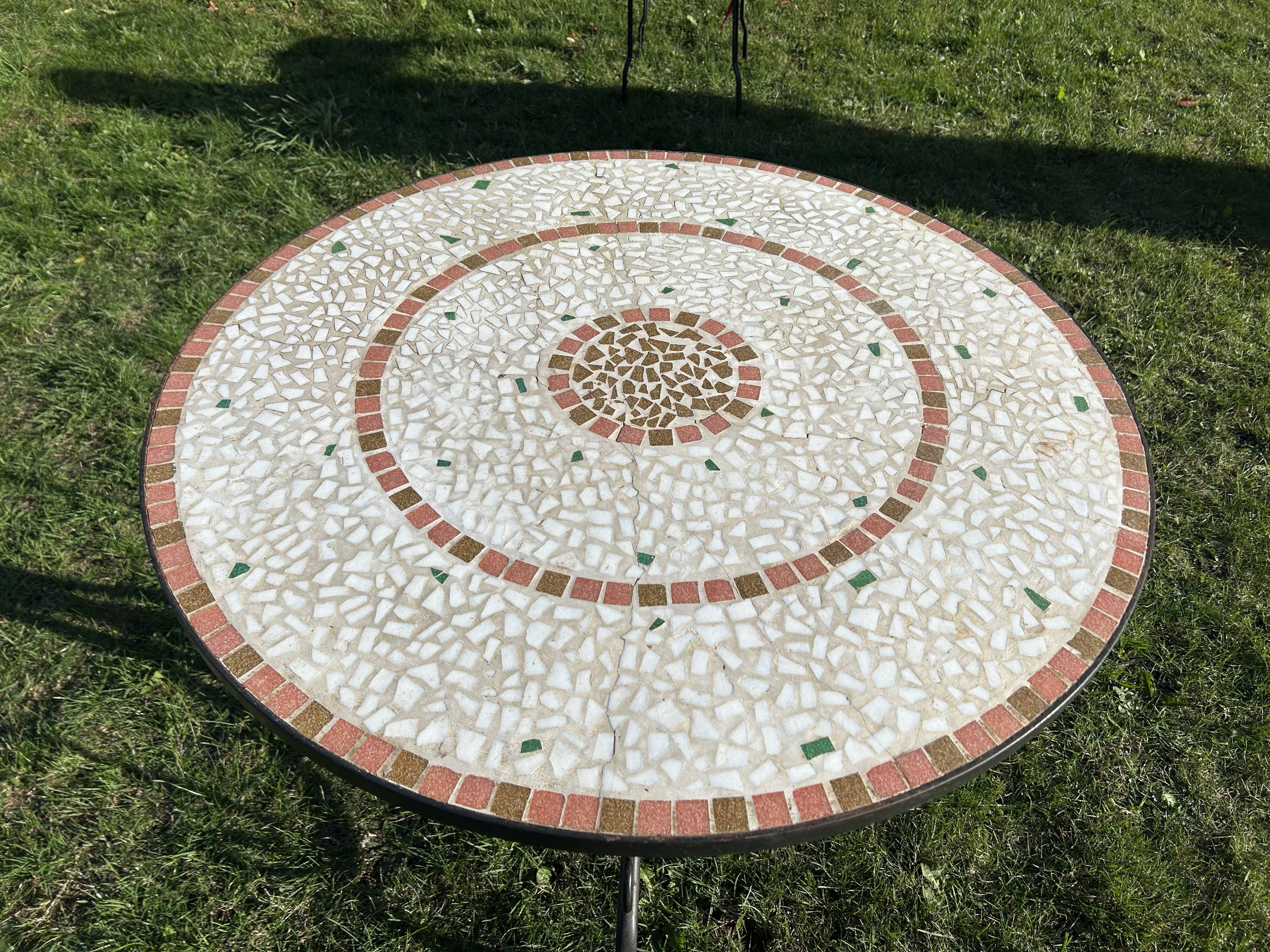 Iron table with ceramic top