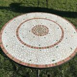 Iron table with ceramic top