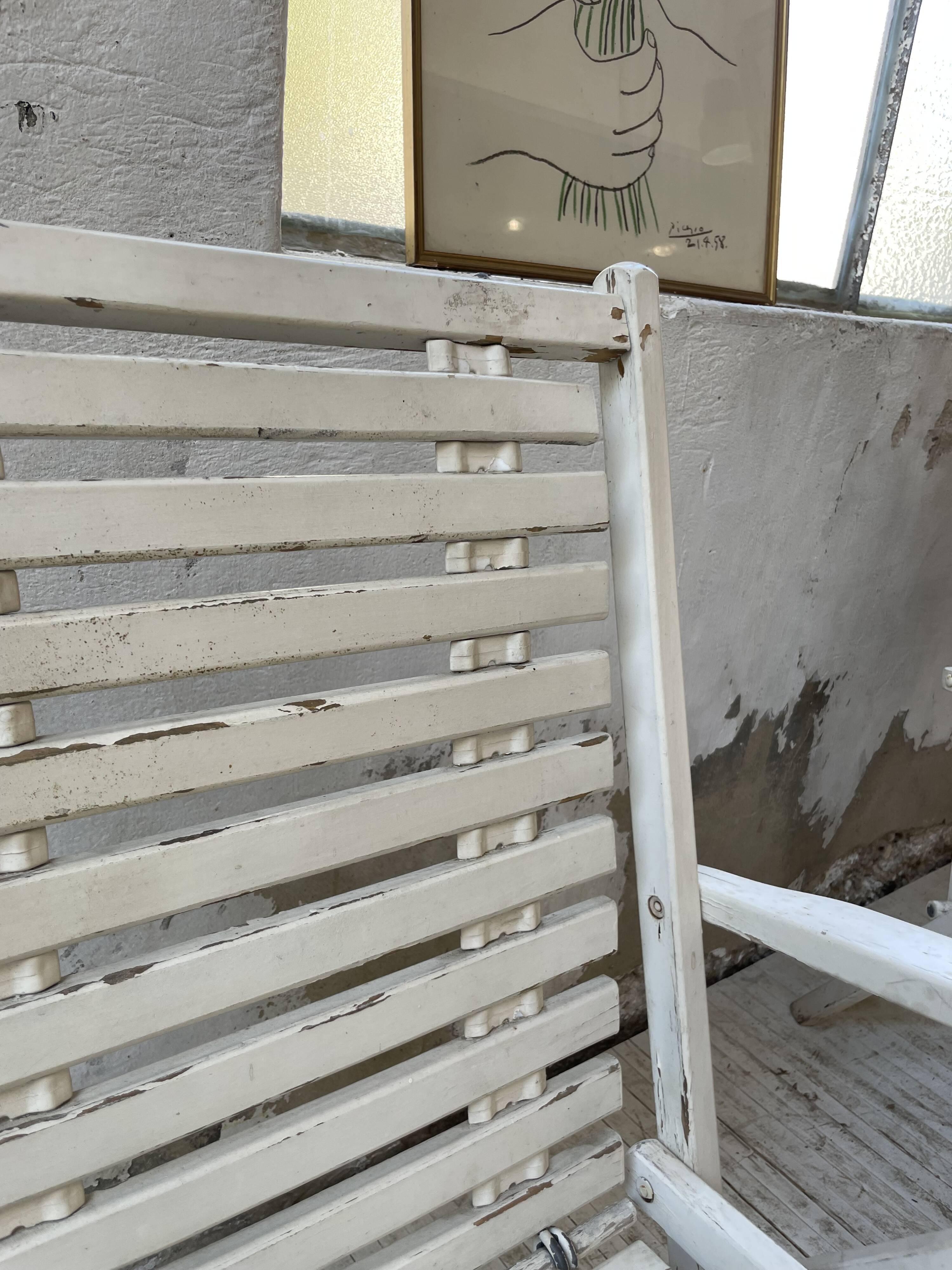 4 white wooden garden chairs