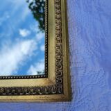 Old mirror in gilded wood