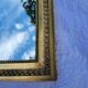 Old mirror in gilded wood