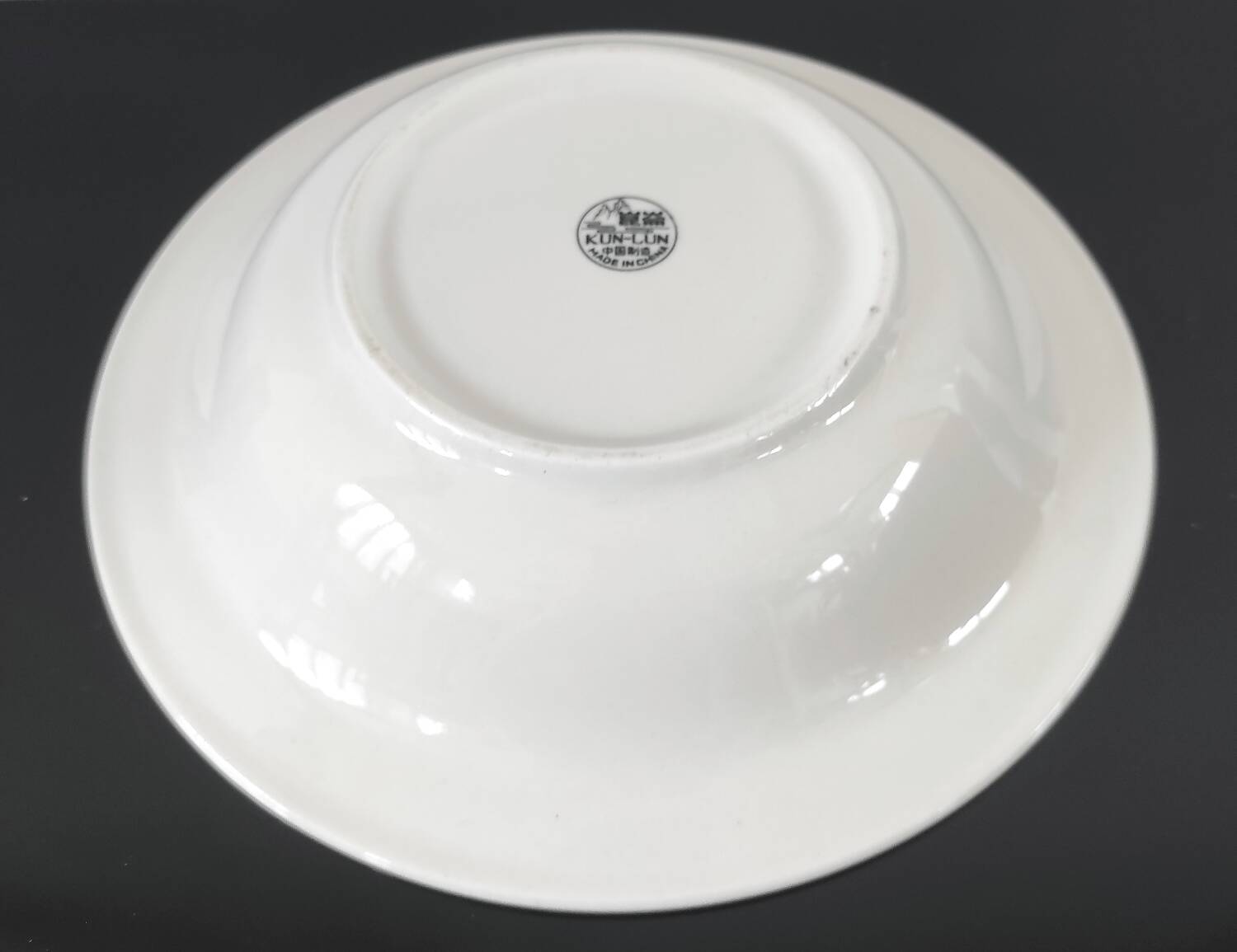 Set of 4 vintage Memphis style deep plates.