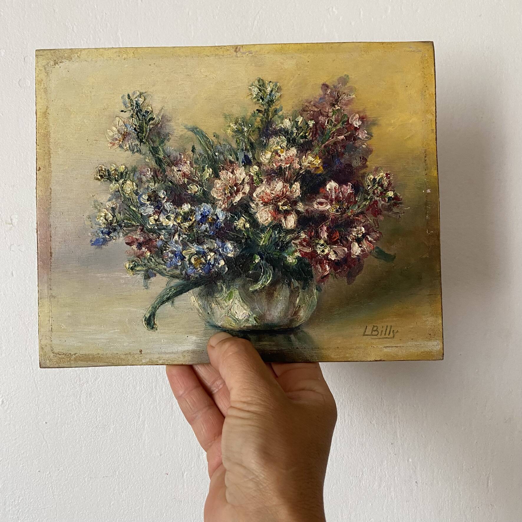 Old painting of a bouquet of flowers, oil on wood.