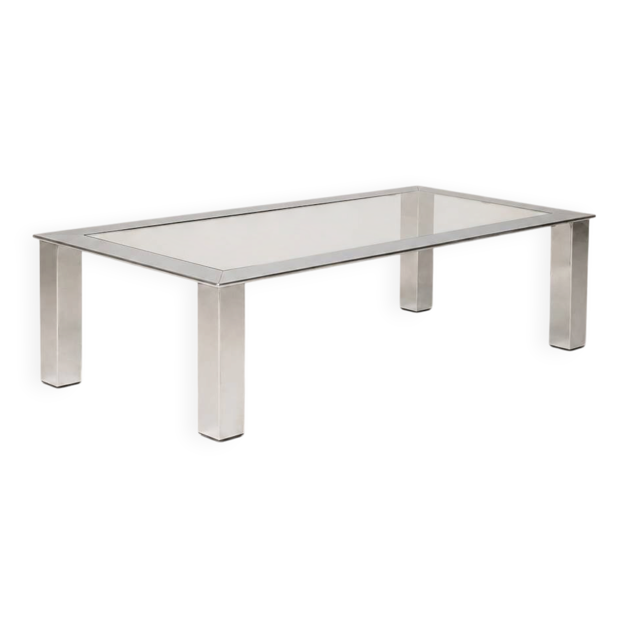 Table basse moderniste en acier chromé et verre clair — Europe, vers 1970