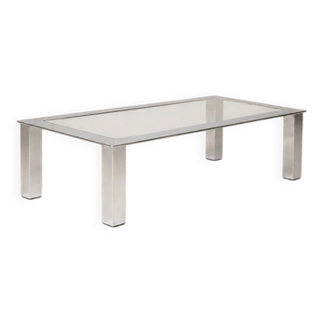 Modernist coffee table in chrome-plated steel and clear glass — Europe, circa 1970