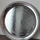 Silver-plated metal dish with a 1980s pattern.