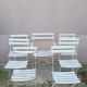 Series of 6 chairs and 1 folding armchair of iron garden bistro