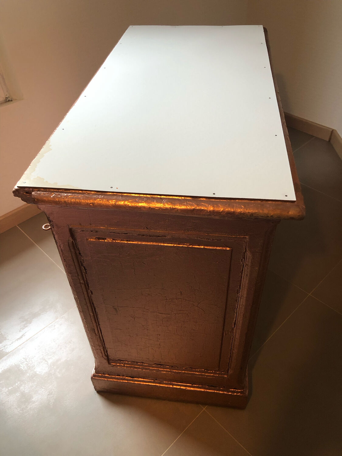 Old chest of drawers restored golden copper color