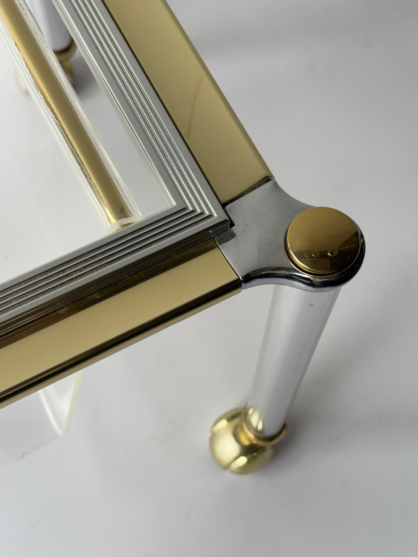 Magazine rack in Plexiglas and gold and chrome metal, 1970