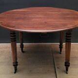 Round table with folding shutters on casters in solid wood year 1973