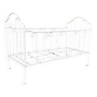 Wrought iron folding child's bed, romantic outdoor bench, 19th century