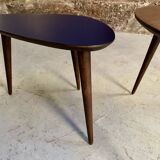 Pair of tripod and nesting coffee tables in walnut and midnight blue