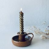 Signed sandstone candle holder