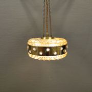Ceiling-hanging lamp in glass with prisms and metal details