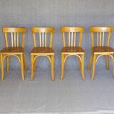 4 Baumann 1950 bistro chairs in “golden oak” color