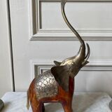 Wooden elephant and brass