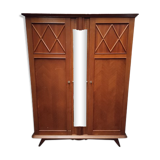 Vintage wardrobe with compass feet and central mirror Scandinavian style design
