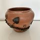 Decorative pot holder in wrought iron and wood