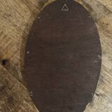 Oval gold knot mirror