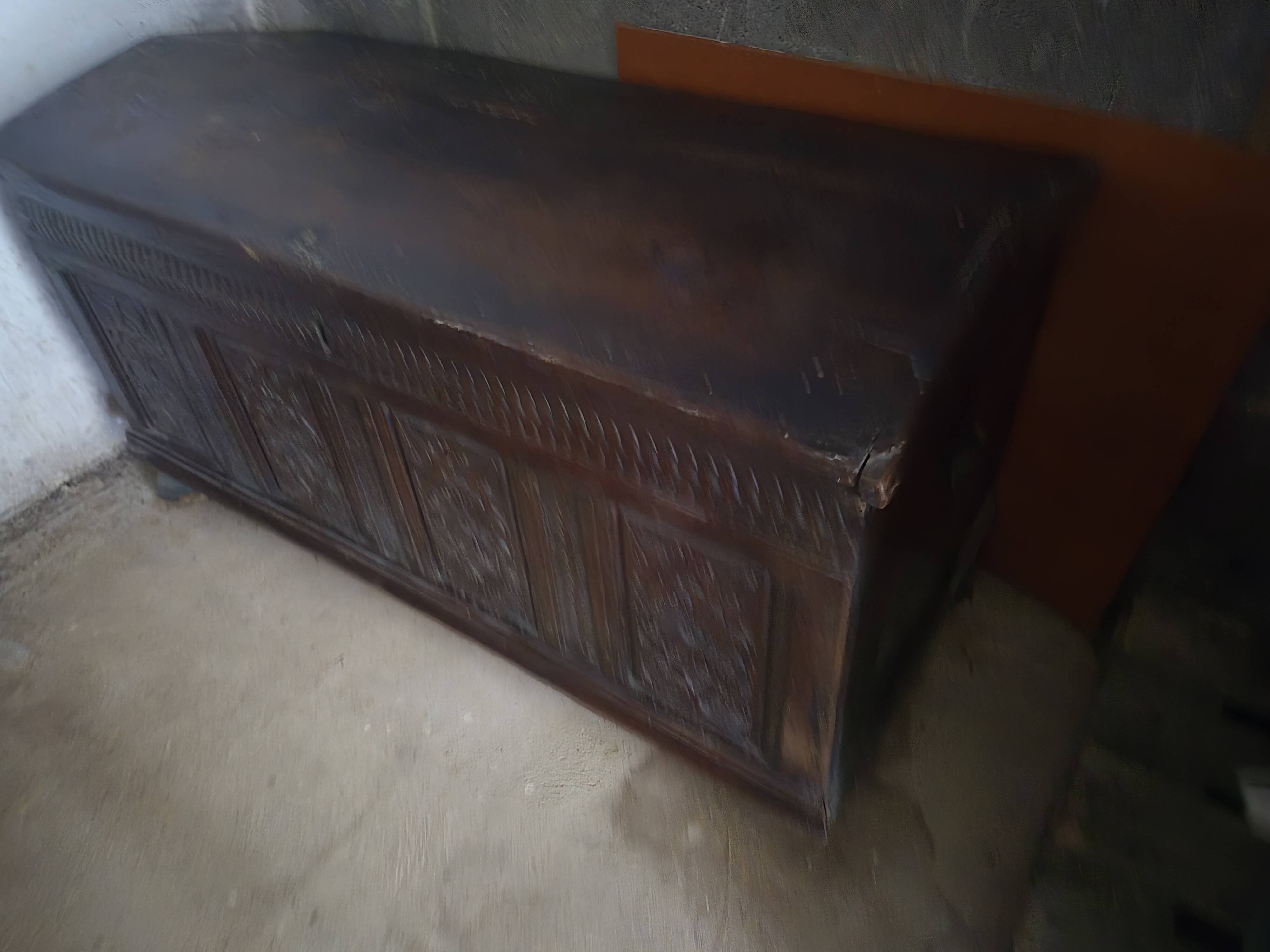 Large carved oak chest from the 17th century.