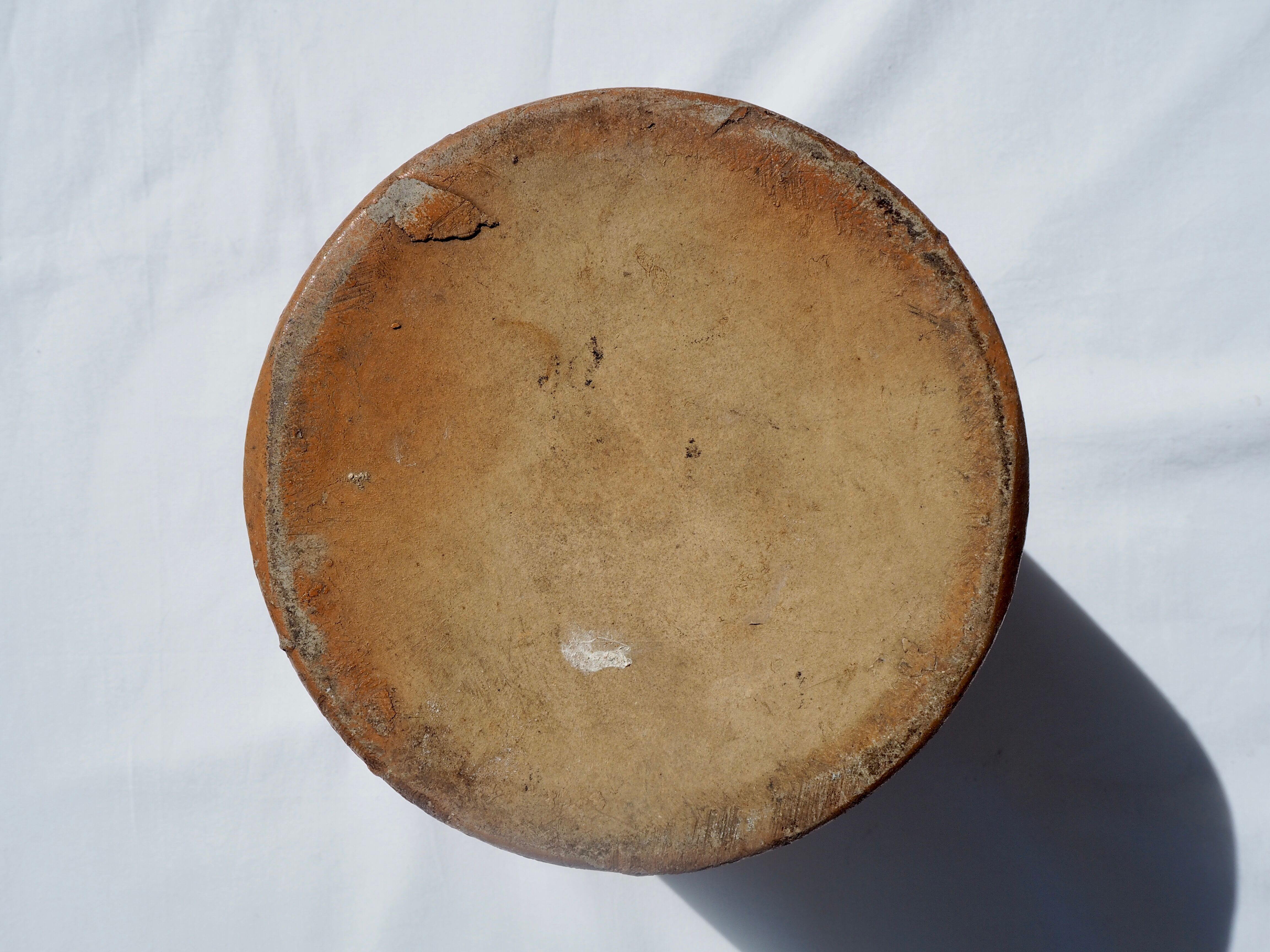 Trio of stoneware pots with lids