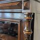 Two-body display cabinet in oak, Henri II style.