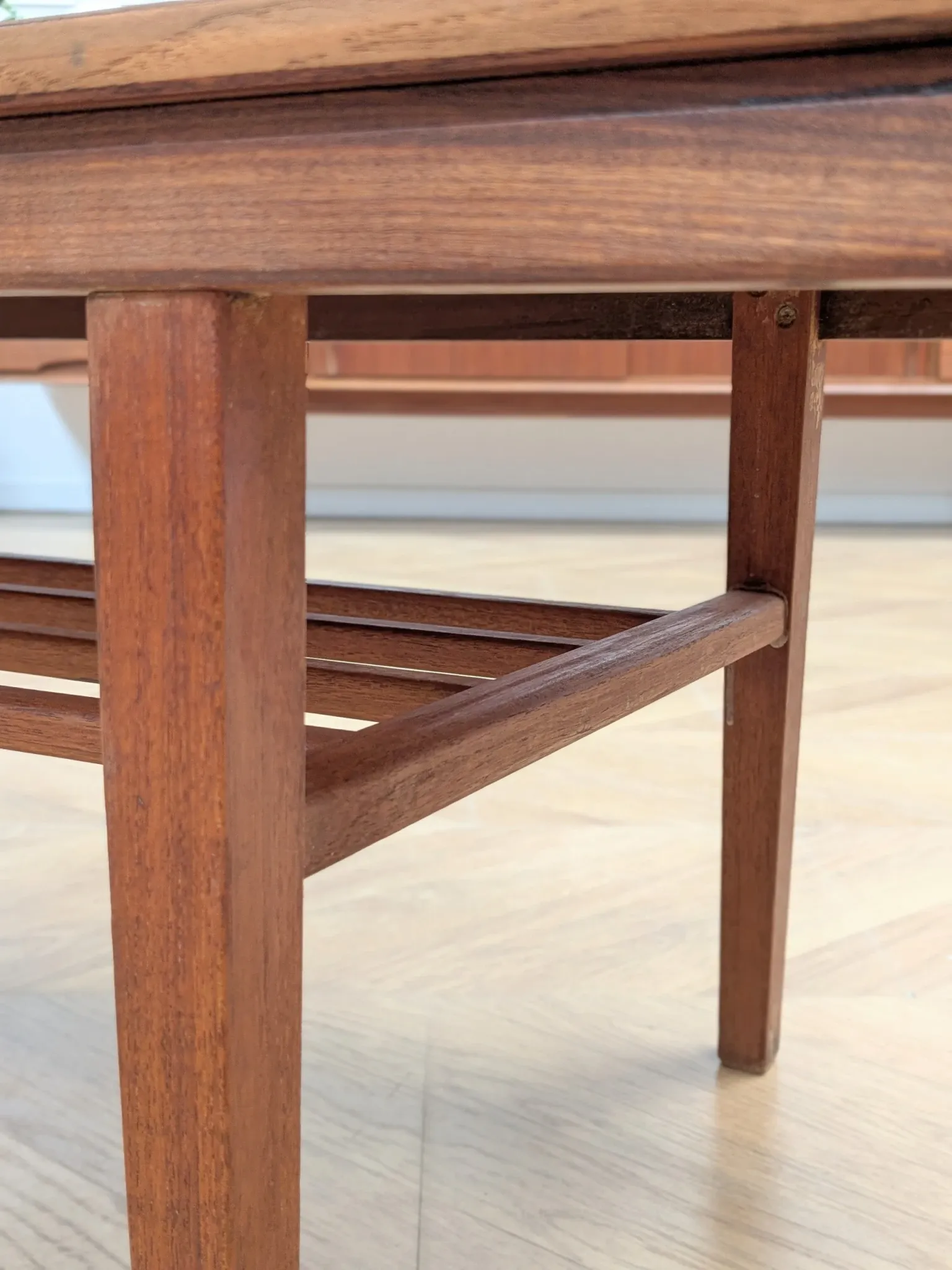 Vintage Danish coffee table in teak with a black top from the 1960s.