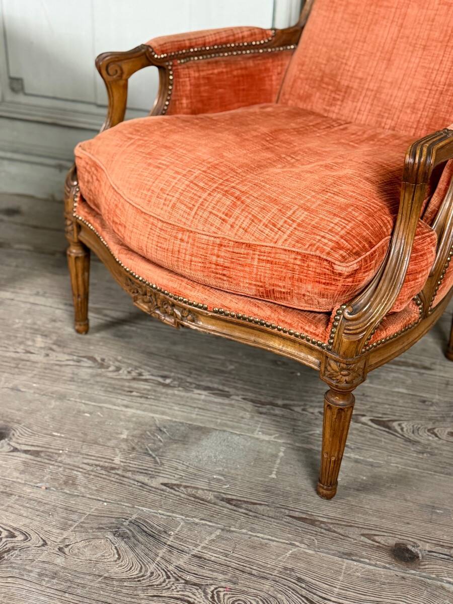 Pair of transitional carved wooden armchairs, 18th century