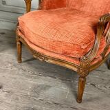 Pair of transitional carved wooden armchairs, 18th century